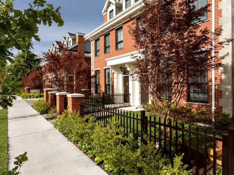 exterior brick, classic details, symmetrical facade, pediment, Georgian style, dentil moulding in cornice, Maxine Whitehead design