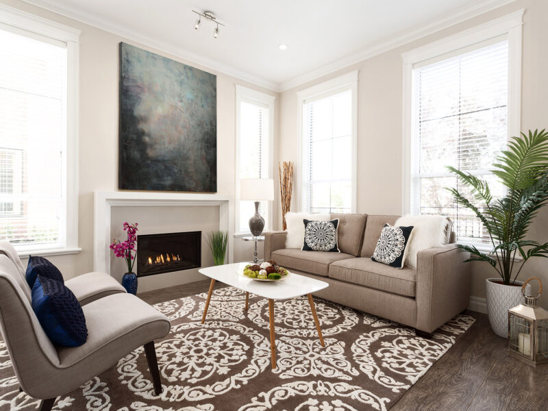 clean lines in modern living room, classic mix with natural materials, minimalist modern fireplace, soft patterned rug underfoot, light and airy living room, Maxine Whitehead design