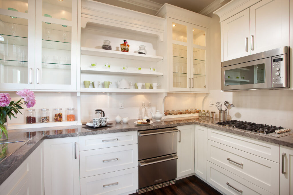 Wine cooler in butler's pantry, polished quartz countertops, pantry storage, spice kitchen, second kitchen, double drawer dishwasher, gas cooktop, fresh white paint palette, Maxine Whitehead design