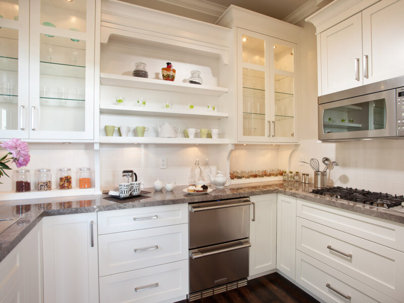 Wine cooler in butler's pantry, polished quartz countertops, pantry storage, spice kitchen, second kitchen, double drawer dishwasher, gas cooktop, fresh white paint palette, Maxine Whitehead design