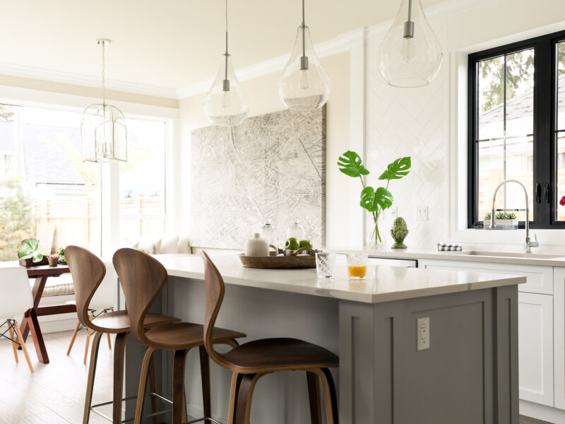 bespoke kitchen design, shaker style kitchen cabinets, spacious kitchen island, polished quartz countertops, statement pendants light the island, Maxine Whitehead Design