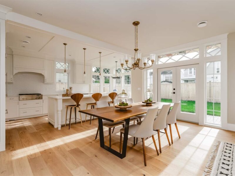 bespoke kitchen design, timeless white kitchen style, classic white kitchen, spacious kitchen island, polished quartz countertops, iconic mid-century counter stool, Norman counter stool, live edge dining table, entertaining space, Maxine Whitehead Design