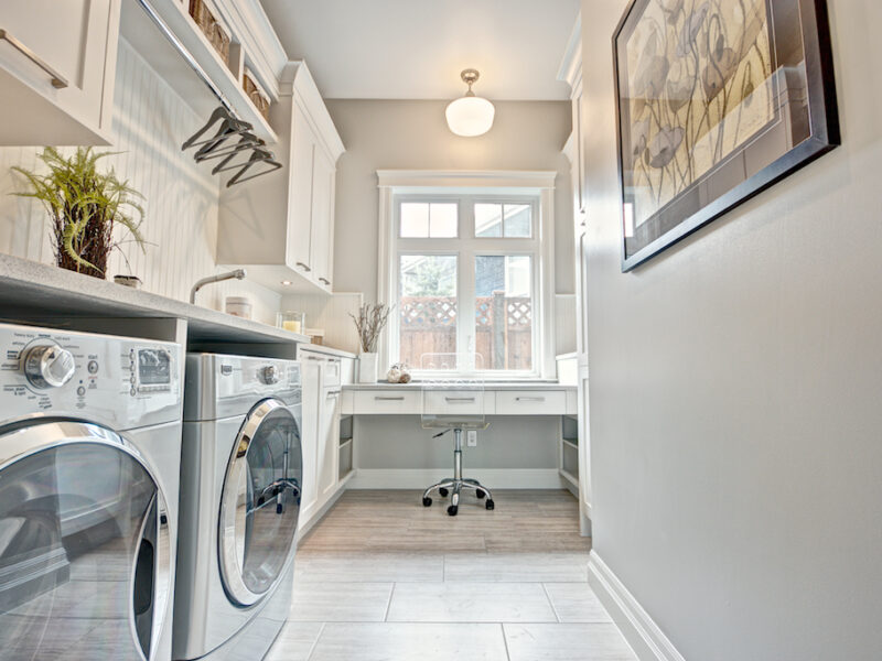 luxury laundry room, home studio, stylish laundry room, spacious quartz countertops, storage solutions, open shelving, baskets, clutter-free laundry room, Maxine Whitehead design