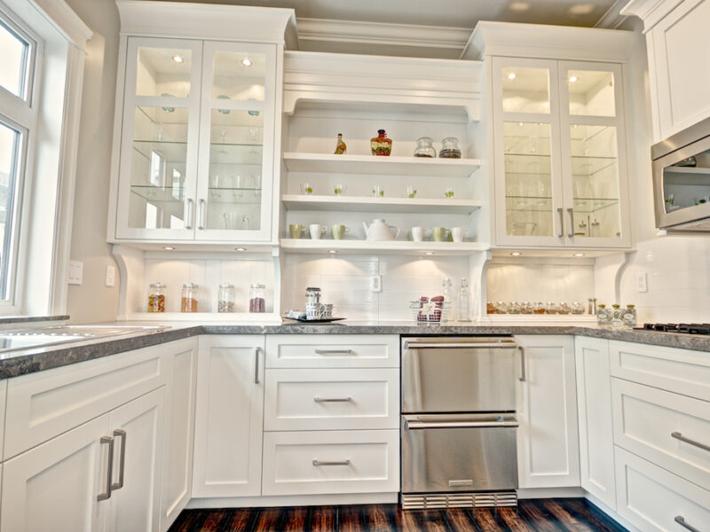 Wine cooler in butler's pantry, polished quartz countertops, pantry storage, spice kitchen, second kitchen, double drawer dishwasher, gas cooktop, fresh white paint palette, Maxine Whitehead design