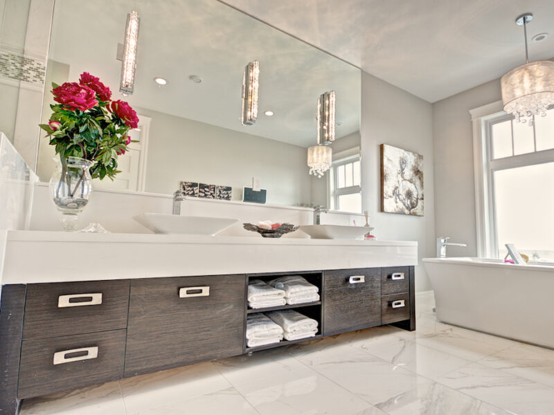 bathroom retreat, spa-like luxurious bathroom, elegant en-suite bathroom, polished quartz, sleek porcelain tiles, freestanding tub, soaker tub, glamorous bathroom lighting, Maxine Whitehead design